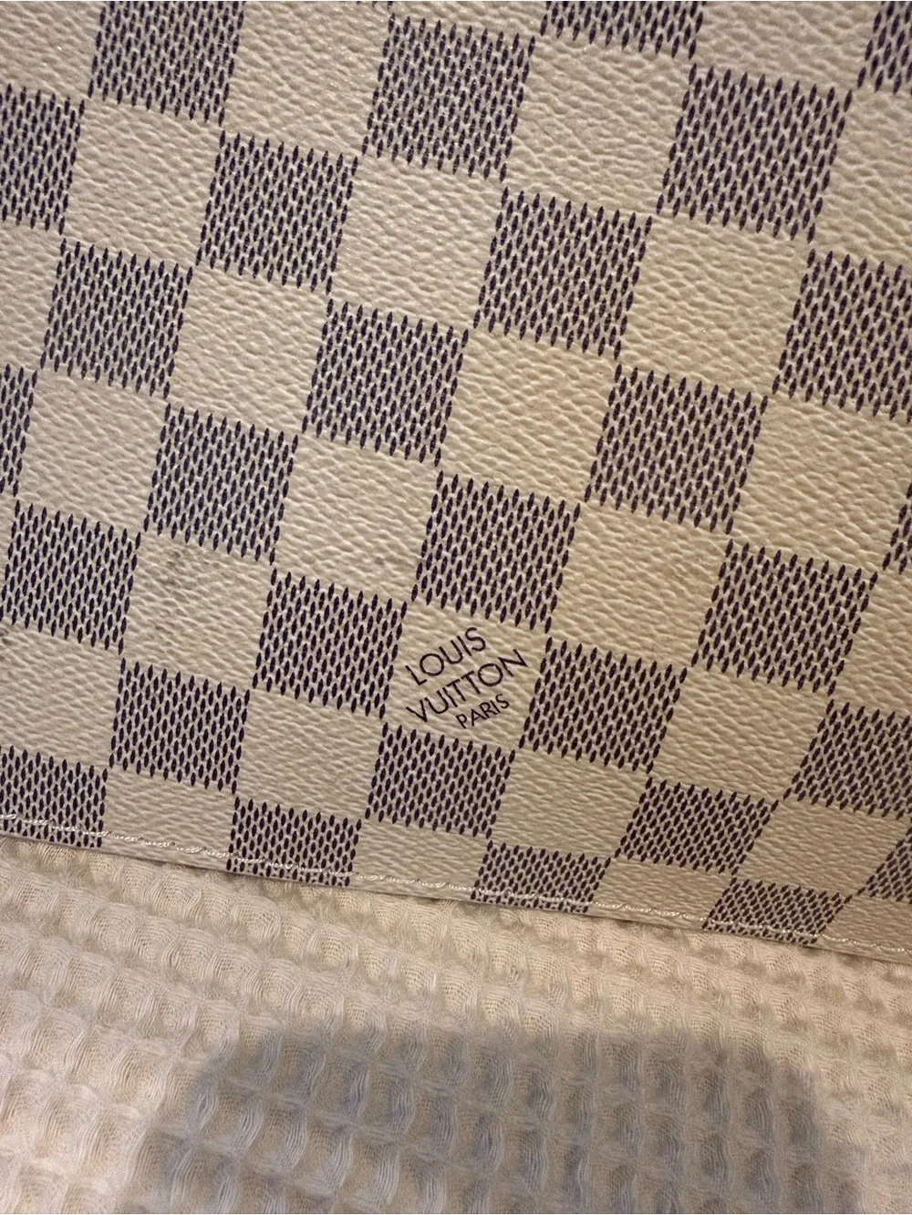 Checkered Wristlet Clutch in Cream and Gray with Gold-Tone Accent